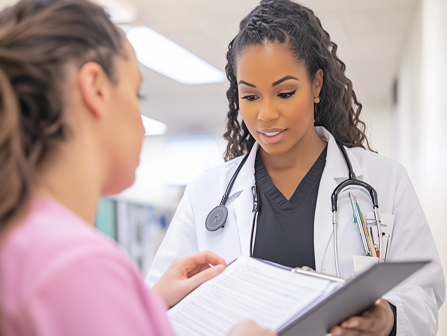 Nurse reviewing patient chart, representing medication error cases